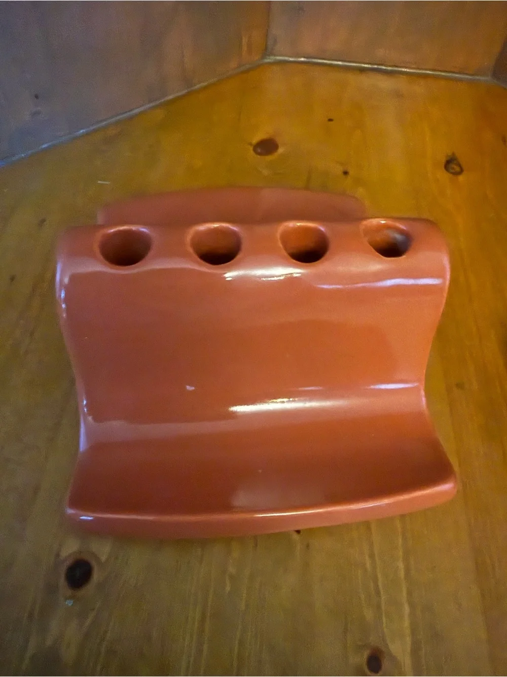 vintage Royal Haeger ceramic bathroom accessories in a terra-cotta peach glaze